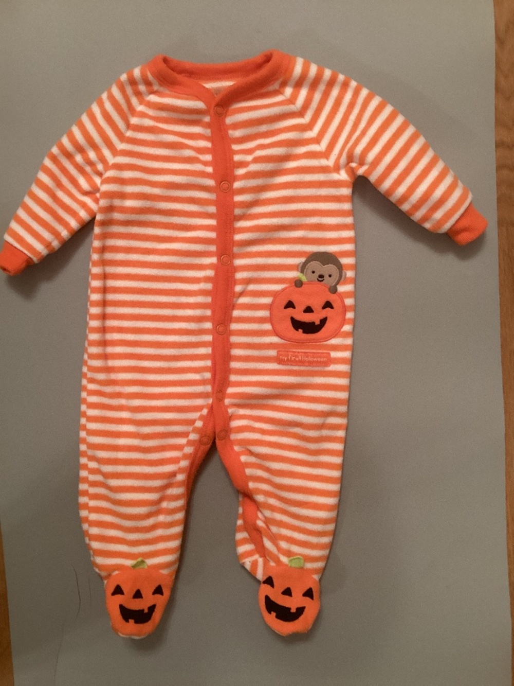Carter’s orange & white striped sleeper (3 mo.)